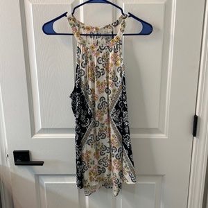 Tank top multi colored. High neck. Shows off shoulders.